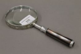 A vintage mother-of-pearl handled magnifying glass. 20 cm long.