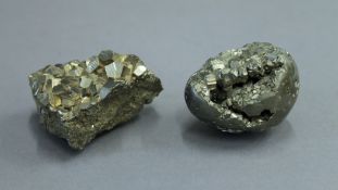 Two fools gold specimens (pyrite). The largest 6 cm long.
