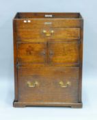 A George III oak tray top side cupboard with large base drawer. 72.5 cm wide.