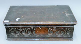 An 18th century carved oak Bible box.