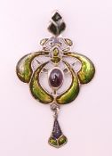 An Art Nouveau style silver pendant. 6 cm high.