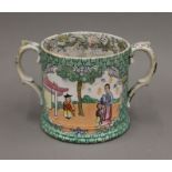 A late 18th/early 19th century English loving cup in the chinoiserie style,