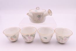 A Chinese miniature five piece porcelain tea set. The tea pot 6.5 cm wide.