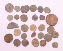 A collection of 1st-4th century Roman coins.