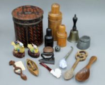 A box of various treen, metalware, pipes, etc.