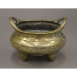 A Chinese bronze censer, with seal mark to base. 13 cm wide.