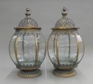 A pair of small lanterns. 45 cm high.