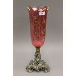 A 19th century cranberry and ormolu vase. 45 cm high.