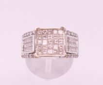 A 14 ct white gold pave set diamond ring. Total diamond weight approximately 1.5 carats.