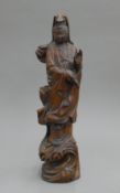 A carved model of Guanyin. 39.5 cm high.