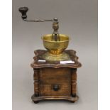 A vintage coffee grinder. 30 cm high.