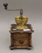 A vintage coffee grinder. 30 cm high.