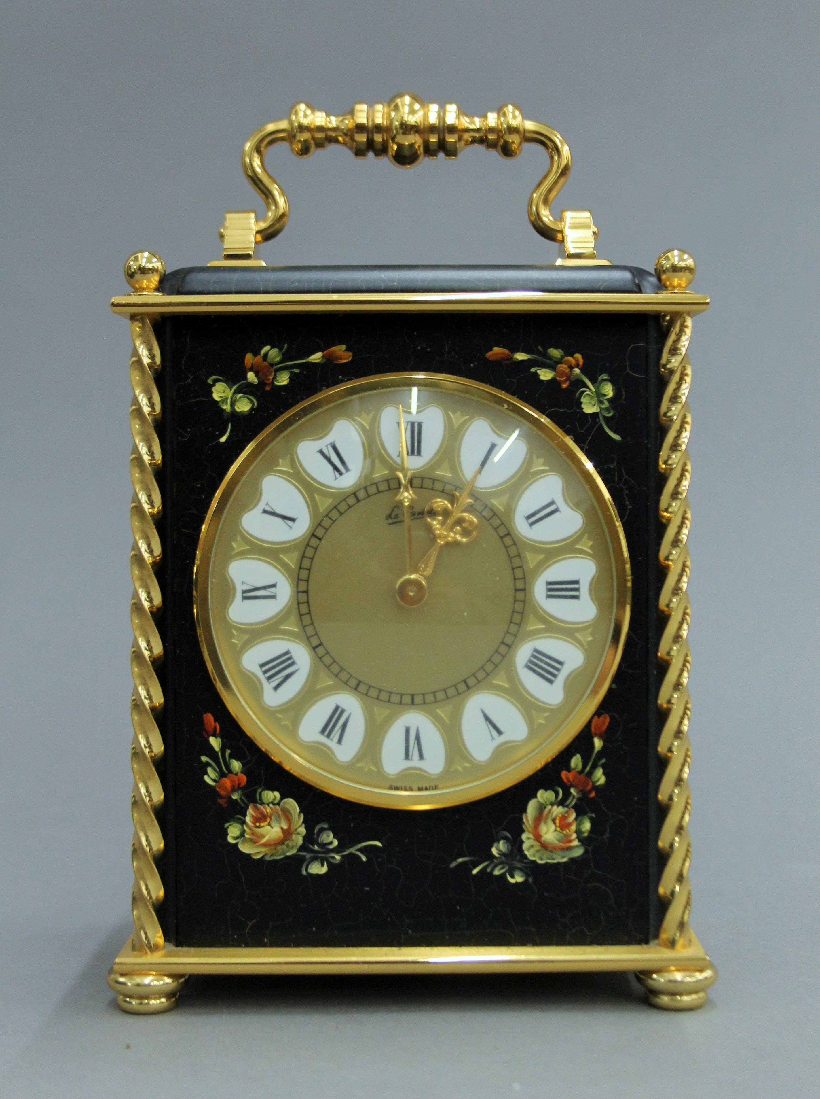 A vintage mantle clock. 18 cm high.