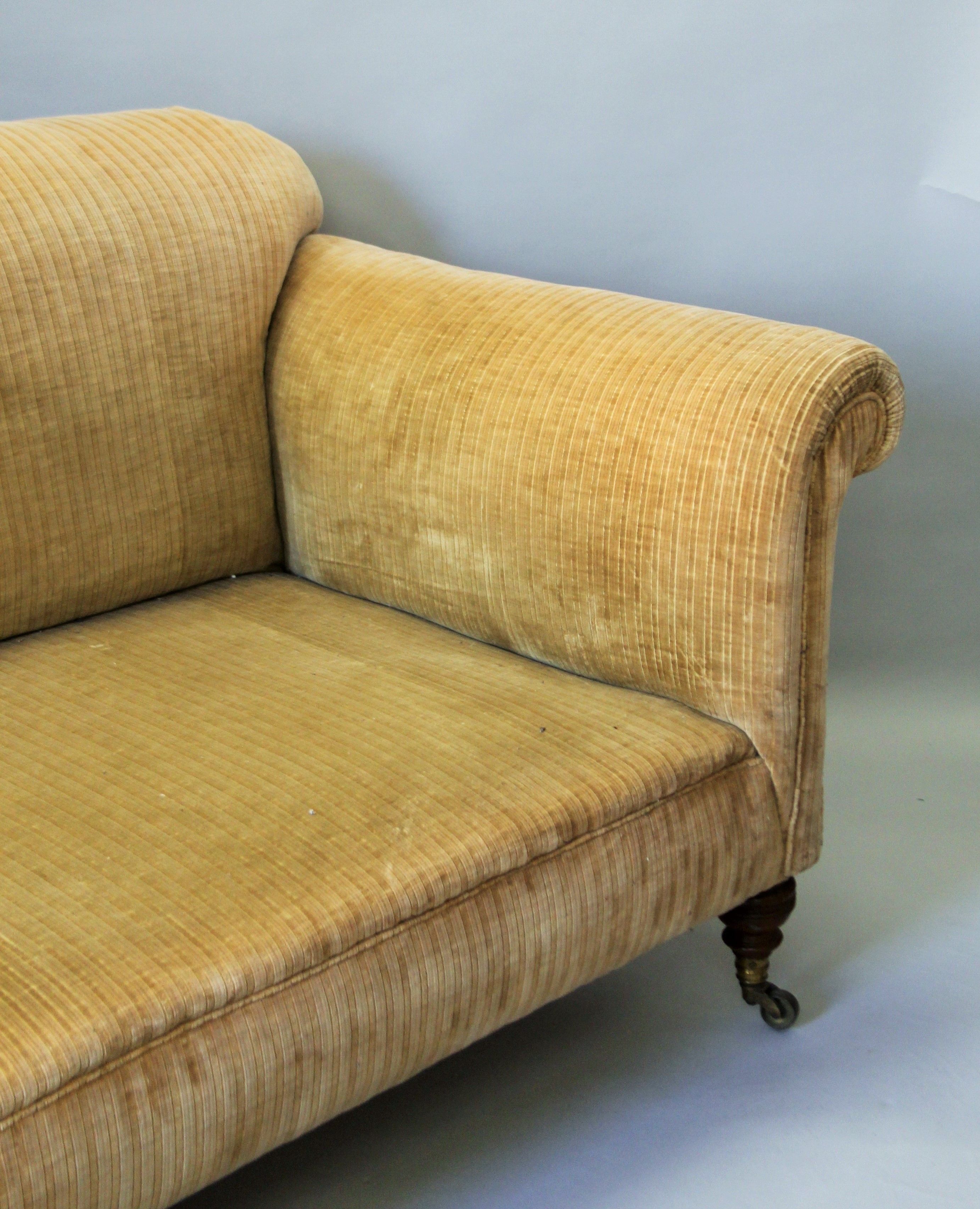 A large Victorian upholstered settee by Howard and Sons, with three turned front legs, - Image 2 of 6
