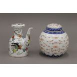 A Chinese famille rose water dropper and a Chinese rice grain decorated ginger jar.