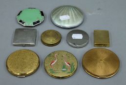 Nine various compacts.