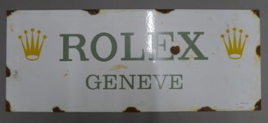 A Rolex enamel sign. 58 cm wide.