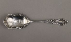 An American sterling silver ornate spoon, the bowl decorated with Capitol Washington DC building.