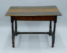 An 18th century and later oak side table. 110 cm wide.
