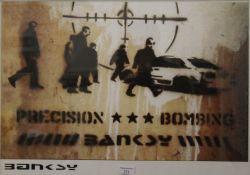BANKSY (born 1974) British (AR), Precision Bombing poster, framed and glazed. 58 x 37 cm.