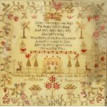 An 1823 needlework sampler, worked by Caroline College, framed and glazed. 41.5 x 42 cm overall.