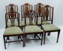 A set of four Edwardian mahogany dining room chairs and two 19th century elm side chairs.