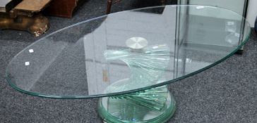 A modern glass coffee table. 115 cm long.