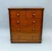 A Victorian mahogany chest of drawers. 98 cm wide.