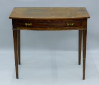 A 19th century mahogany bow front side table. 83 cm wide.