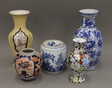 Five various vases. The largest 31 cm high.