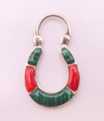 A silver malachite and coral padlock. 4 cm high.