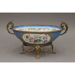 A Continental gilt metal mounted porcelain centre bowl. 37 cm long.