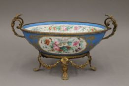 A Continental gilt metal mounted porcelain centre bowl. 37 cm long.