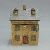 A tea caddy formed as a house. 20.5 cm high.