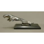 A chrome Jaguar mascot mounted on a plinth base. 22.5 cm long.