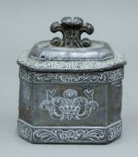 An 18th/19th century lead tobacco pot. 10 cm high.