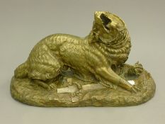 A 19th century bronze model of a dog. 47 cm long.