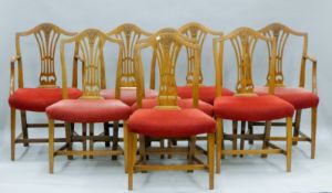 A set of eight 19th century mahogany dining chairs, including two with arms. The latter 57 cm wide.