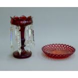 A Victorian ruby glass lustre and a ruby glass bowl. The former 23.5 cm high.