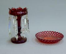 A Victorian ruby glass lustre and a ruby glass bowl. The former 23.5 cm high.