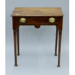 A 19th century oak single drawer side table. 68 cm wide.