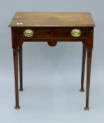 A 19th century oak single drawer side table. 68 cm wide.