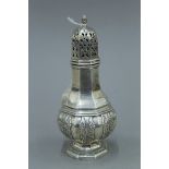 A silver sugar sifter. 19 cm high. 209.5 grammes.