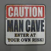 An iron Man Cave sign.