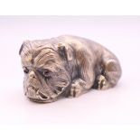 A silver model of a dog bearing Russian marks. 6.5 cm long.