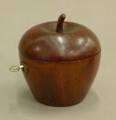 An apple form tea caddy. 11 cm high.
