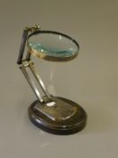 A large magnifying on stand.