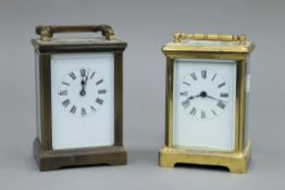 Two brass cased carriage clocks. Each approximately 15 cm high overall.