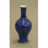 A small Chinese blue porcelain vase. 13 cm high.