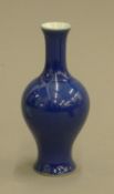 A small Chinese blue porcelain vase. 13 cm high.